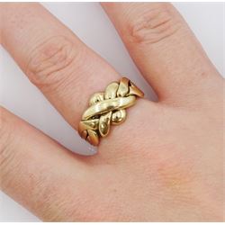 Gold puzzle ring, stamped 9ct