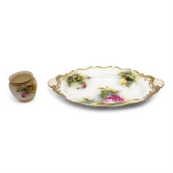 Early 20th century Royal Worcester twin handled dish, painted with roses and buds, within ...