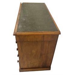 Victorian mahogany twin pedestal desk, rectangular top with inset green leather writing surface, fitted with central frieze drawer flanked by five graduating drawers on each side 