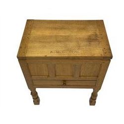 Mouseman - oak work or sewing box, rectangular adzed top inscribed 'L. M. C. 1976' enclosing vacant interior, triple panelled front and double panelled sides, fitted with single drawer, on octagonal supports, carved with mouse signature, by the workshop of Robert Thompson, Kilburn 