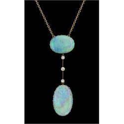 Early 20th century gold opal and diamond pendant necklace, two oval cabochon cut opals spaced by three milgrain set old cut diamonds, total opal weight approx 16.85 carat