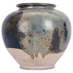 Tang Dynasty style blue-glazed pottery jar or vase, of ovoid form with short lipped rim, the body with cobalt and light blue lustre glaze finishing irregularly above the base, H19cm