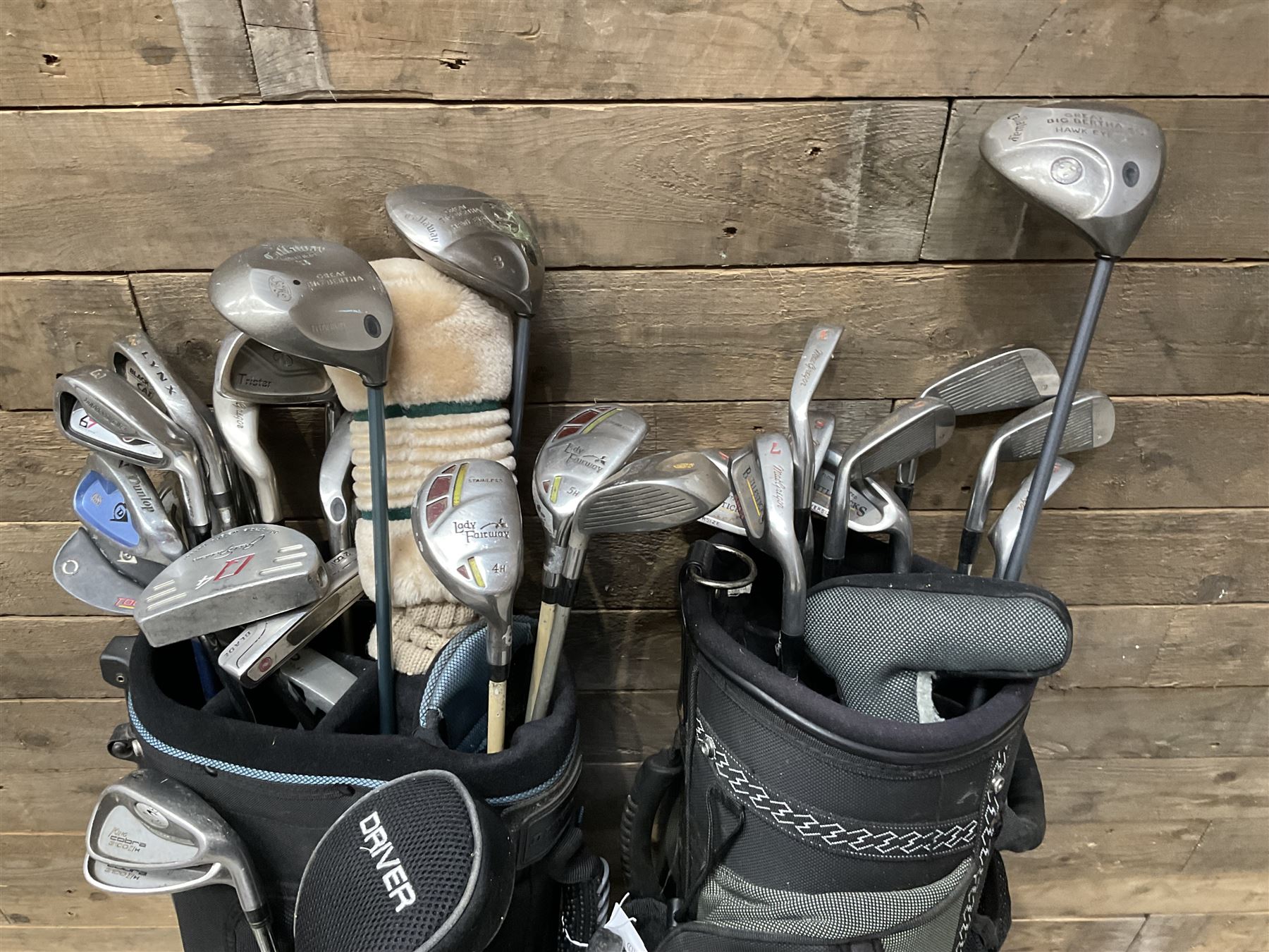 Battlesticks and other golf clubs in three bags