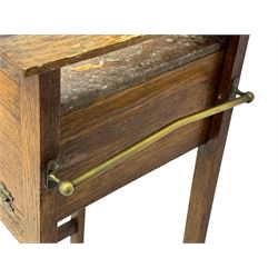 Early 20th century oak vanity stand, with circular adjustable mirror, brass towel rails to the sides, marble inset top and upper compartment, over additional storage compartment with hinged front, on splayed supports with stretchers