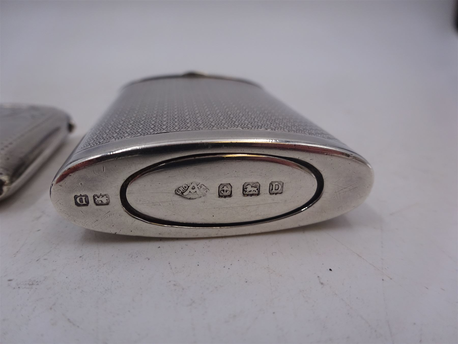 1920s silver sliding vesta case, with engine turned decoration, hallmarked Adie Brothers Ltd, Birmimgham 1928, together with a small silver vesta case, hallmarked