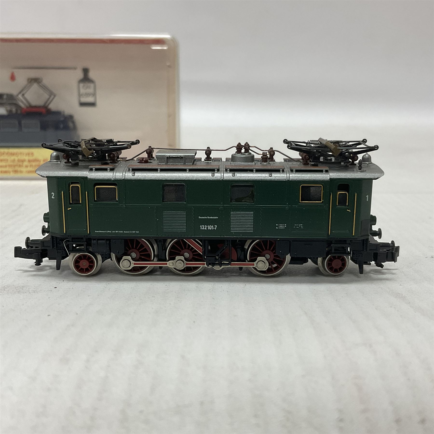 Fleischmann ‘N’ gauge ‘Piccolo’ - Black tank engine no.7000, brown diesel shunter no.7230, boxed dark blue electric locomotive with pantograph no,7335 and dark green class 132 locomotive with pantograph no.7369 (4) 