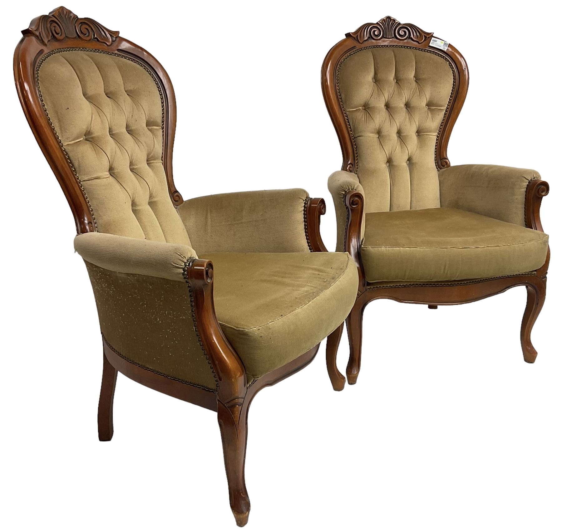 Pair of Victorian design stained beech armchairs, scroll and scallop carved cresting rail, upholstered in buttoned champagne fabric, on cabriole supports