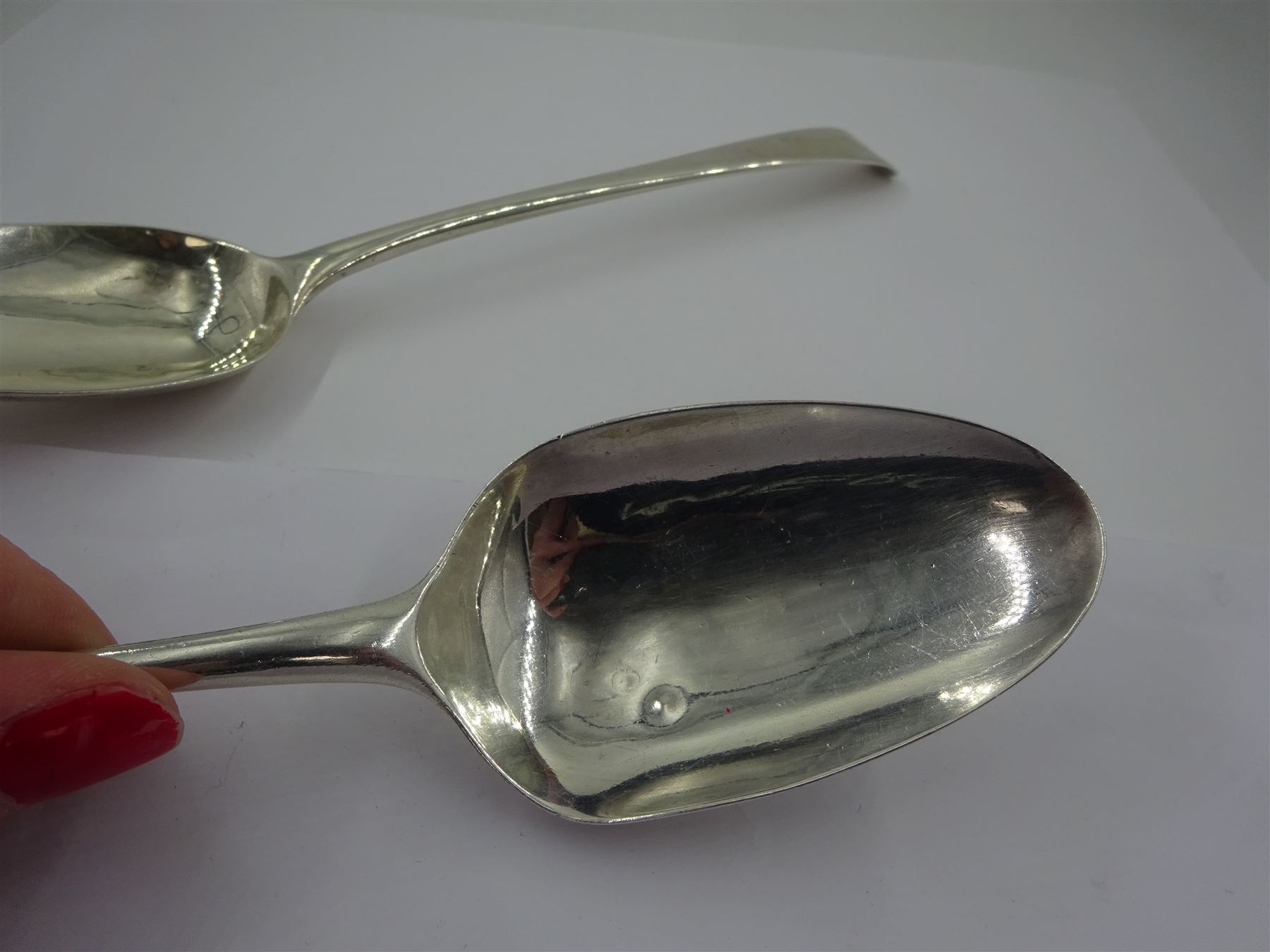 Pair of George III silver Hanoverian pattern spoons, maker's mark T.E, probably Thomas Evans, other elements of hallmarks indistinct