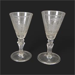 Two 18th century Continental facet cut drinking glasses, each with funnel bowl engraved wi...