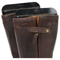 Musto leather shooting boots, size 9, together with size 8.5 leather shooting boots and six gun slips 