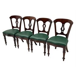 Matched set of twelve Victorian mahogany dining or boardroom chairs, the shaped cresting rail decorated with scrolled decoration, upholstered drop-on seats upholstered in green fabric, on turned supports  