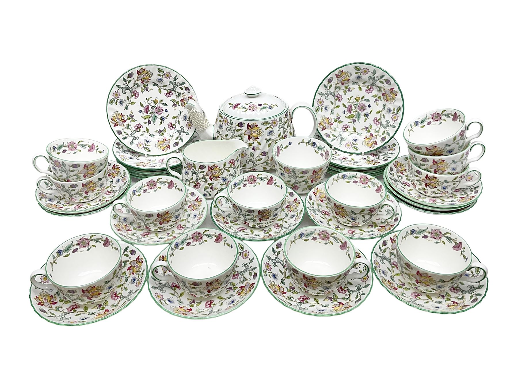 Minton Haddon Hall pattern tea service for twelve place settings, to include teapot, sugar bowl, milk jug, twelve cups and saucers and twelve dessert plates (39)