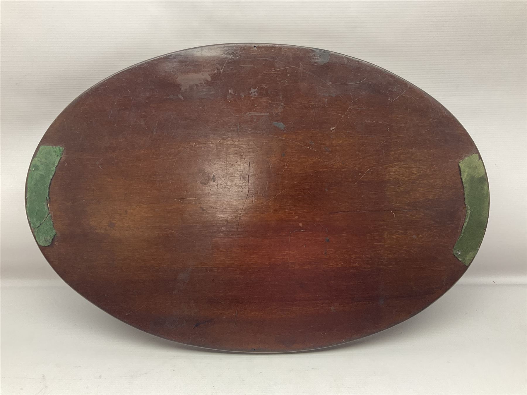 Early 20th century mahogany tray, of oval form with shaped rim and twin brass handles, with inlaid diamond decoration to centre, W67cm