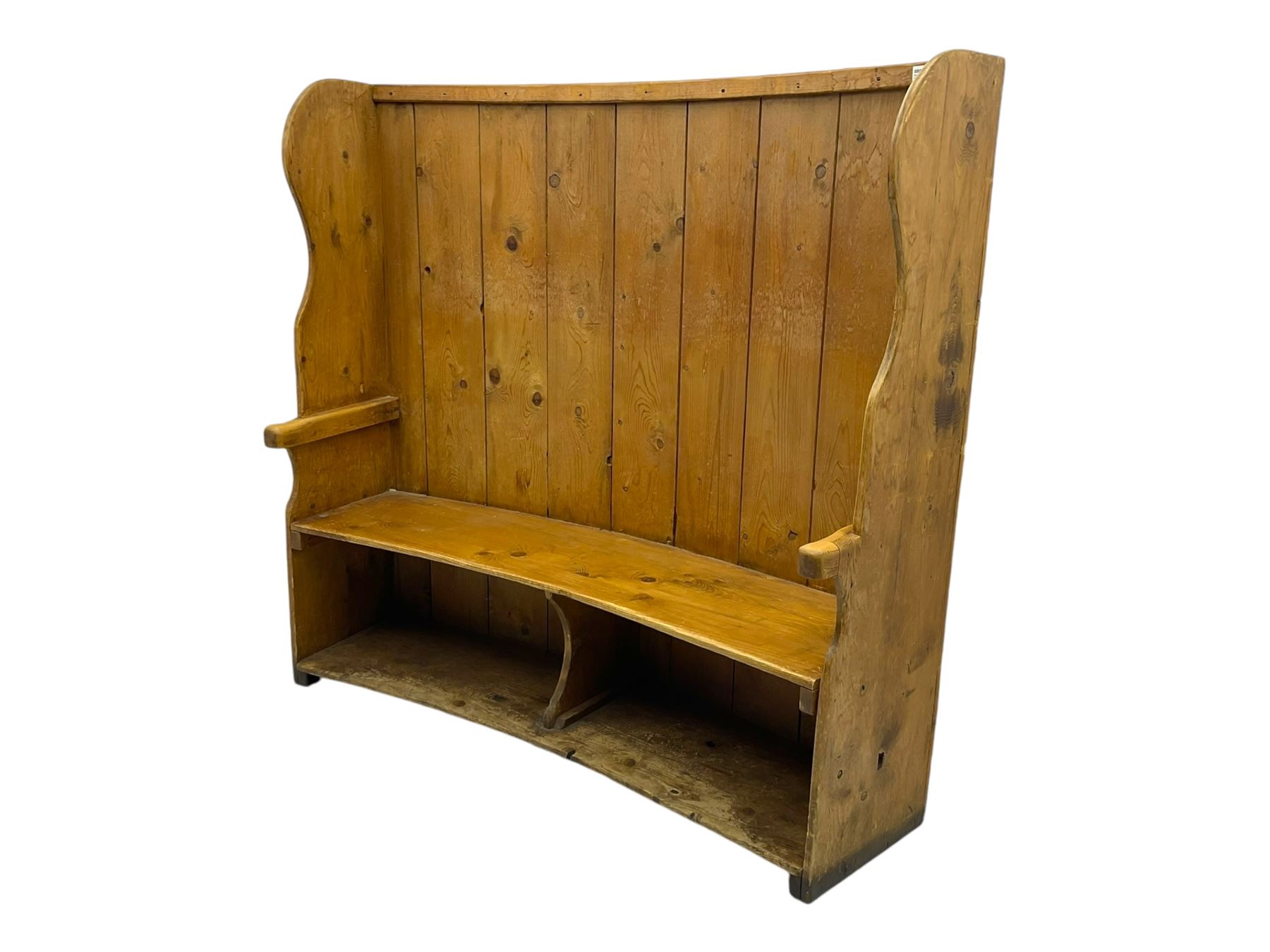 19th century pine barrel back settle, bowed boarded back on shaped end supports, with upholstered squab cushion 