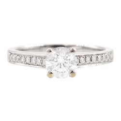 18ct white gold single stone round brilliant cut diamond ring, with diamond set shoulders,...