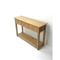 Light oak side console table, three drawers, square supports joined by solid undertier