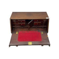 George III mahogany bureau, the fall front enclosing fitted interior, three graduating long drawers, on bracket feet