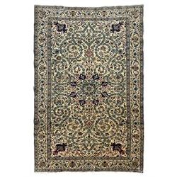 Persian Kashan ivory ground rug, wool with silk inlay, central floral rosette medallion su...