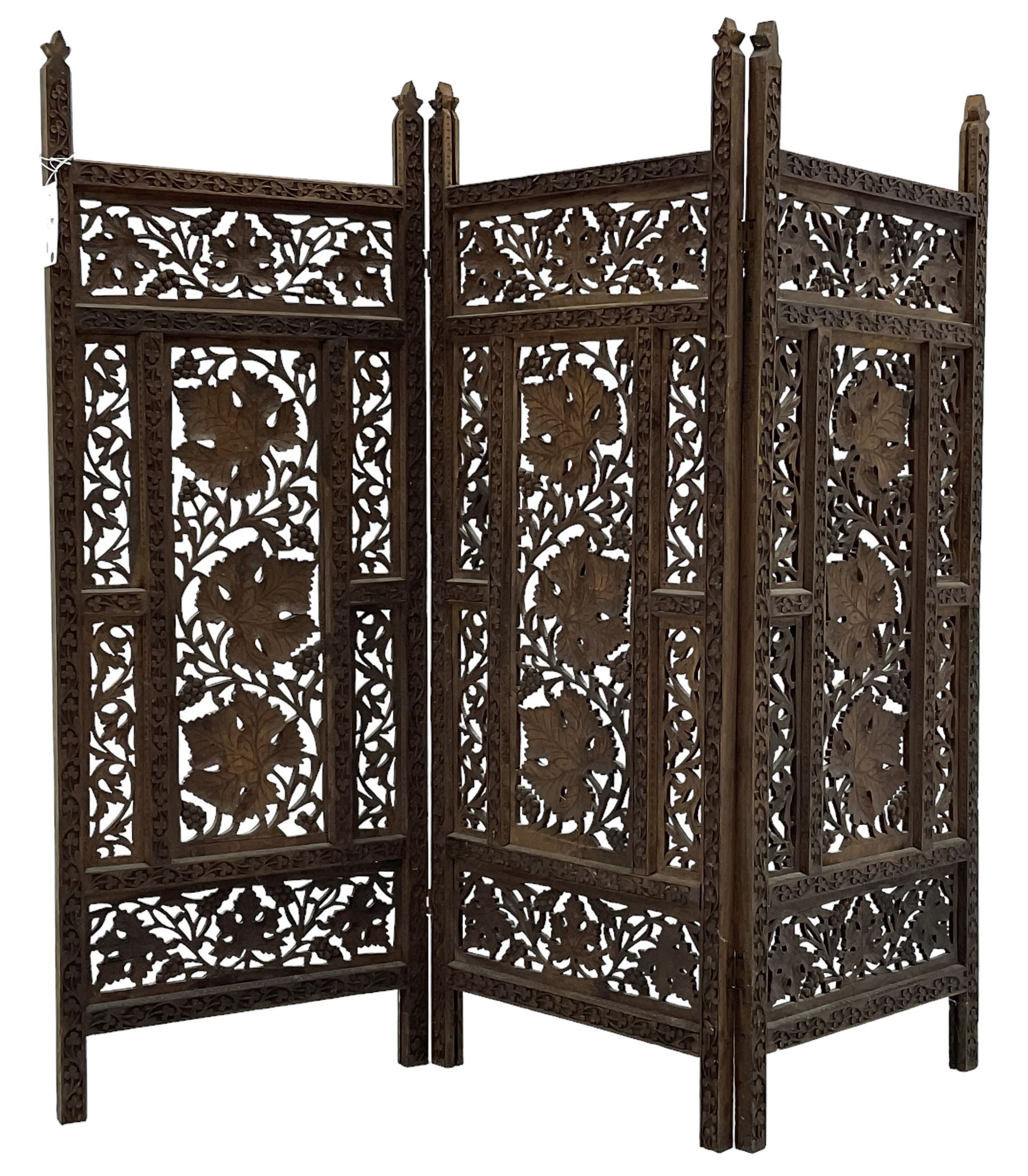 Anglo-Indian heavily carved and pierced three panel folding screen 