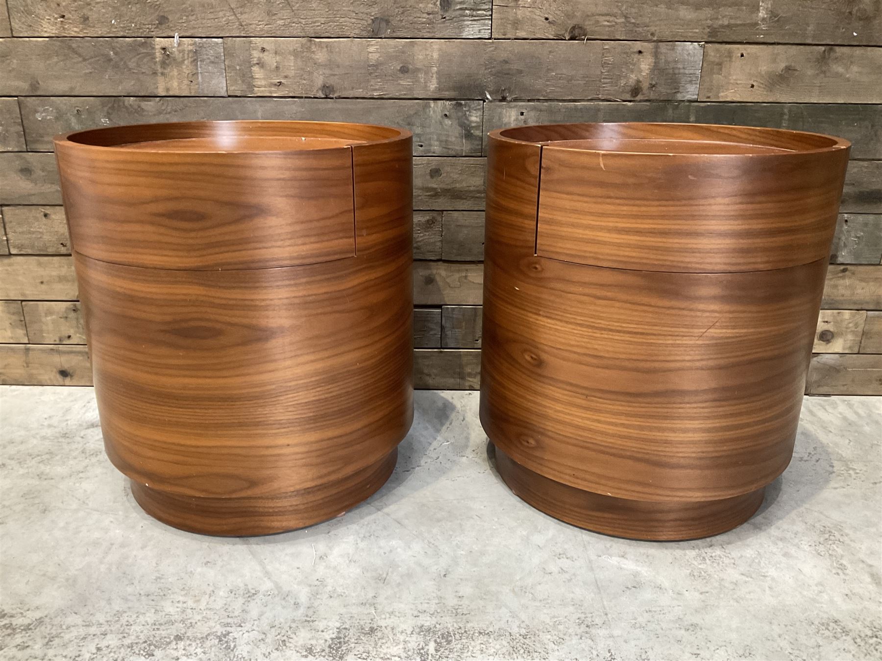 Pair of walnut circular barrel shaped lamp tables, fitted with single drawer