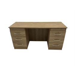 Oak finish twin pedestal desk/dressing table, fitted with six drawers