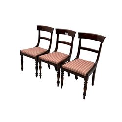 Set of six Victorian mahogany dining chairs, curved bar back over drop-in seat upholstered in striped fabric, on turned front supports