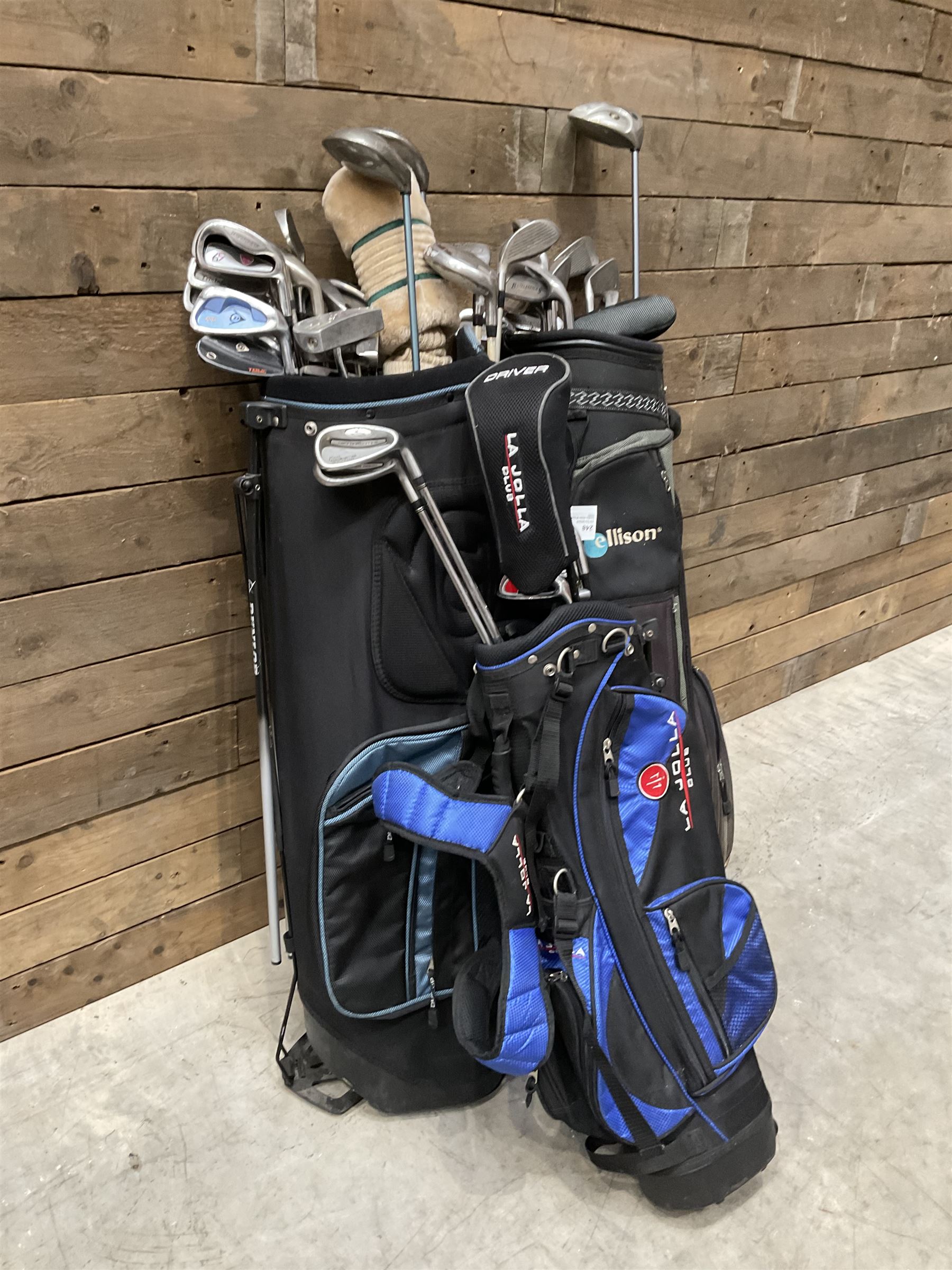 Battlesticks and other golf clubs in three bags