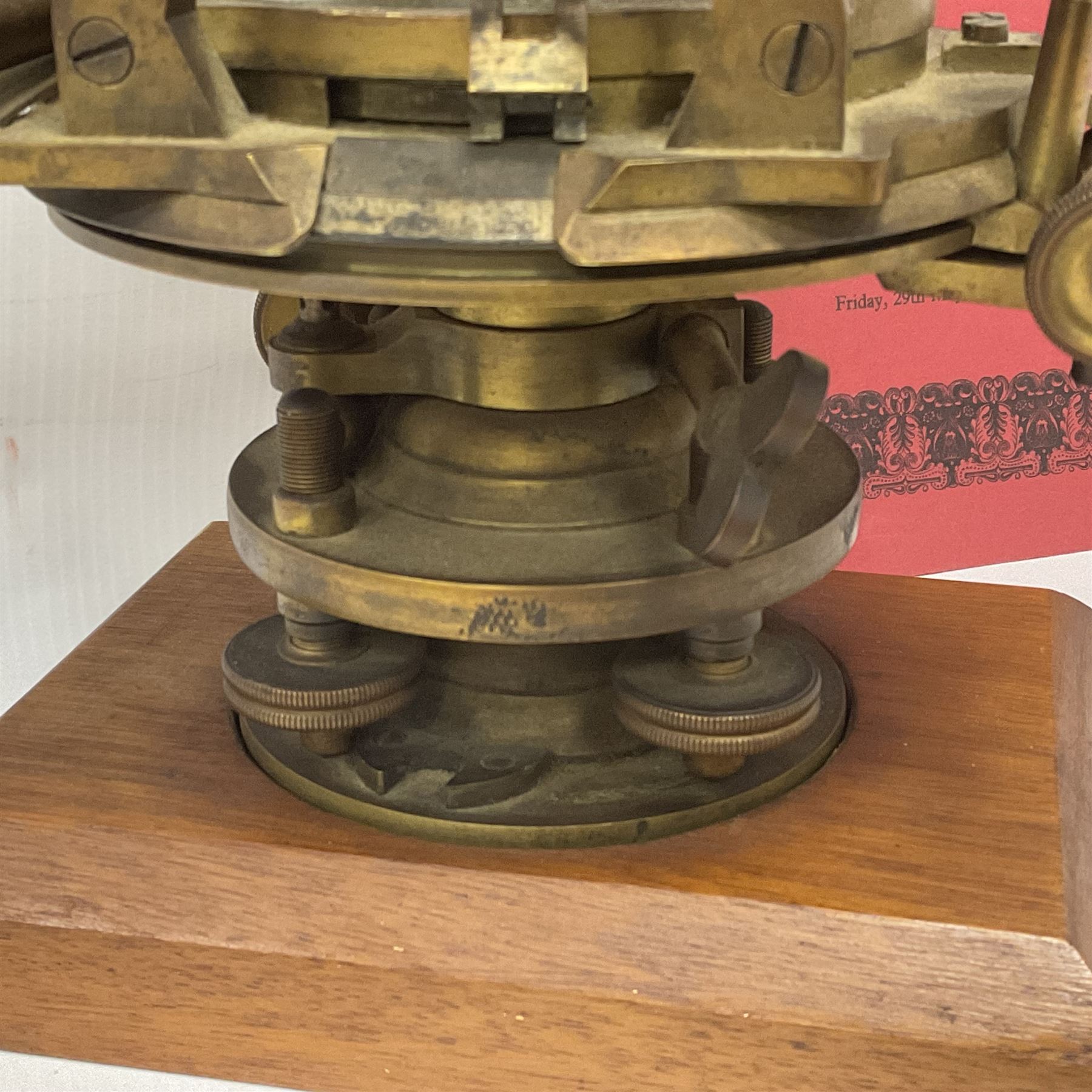 19th century brass transit theodolite by Troughton & Simms, the sighting telescope with rack and pinion focusing, above an inset compass, upon four levelling feet and a rectangular wooden base, including base H35.5cm