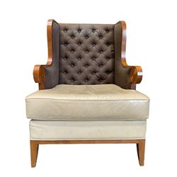 Walnut finish framed wing back armchair upholstered leather and buttoned fabric