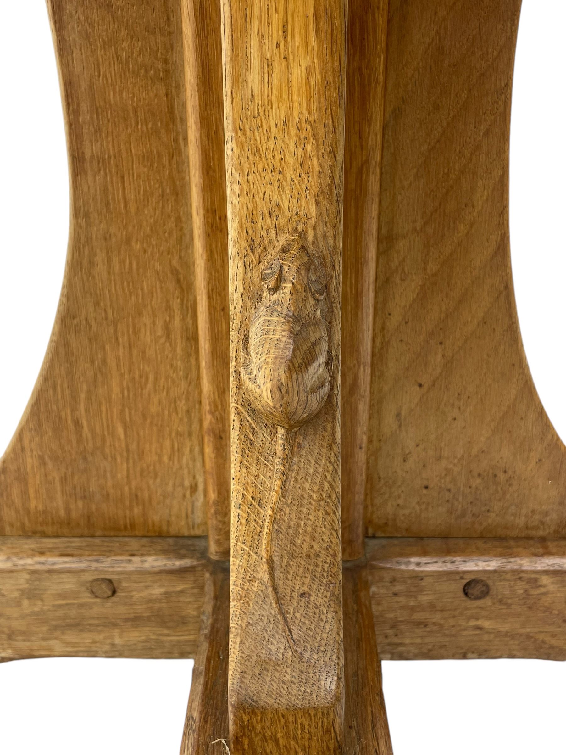 Mouseman - oak occasional table, octagonal adzed top, cruciform pedestal on sledge feet, carved with mouse signature, by the workshop of Robert Thompson, Kilburn 