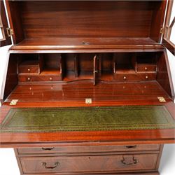 Georgian design inlaid mahogany bureau bookcase, broken pediment over dentil cornice, two astragal glazed doors enclosing shelves, fall-front with fitted interior over two short and three long drawers