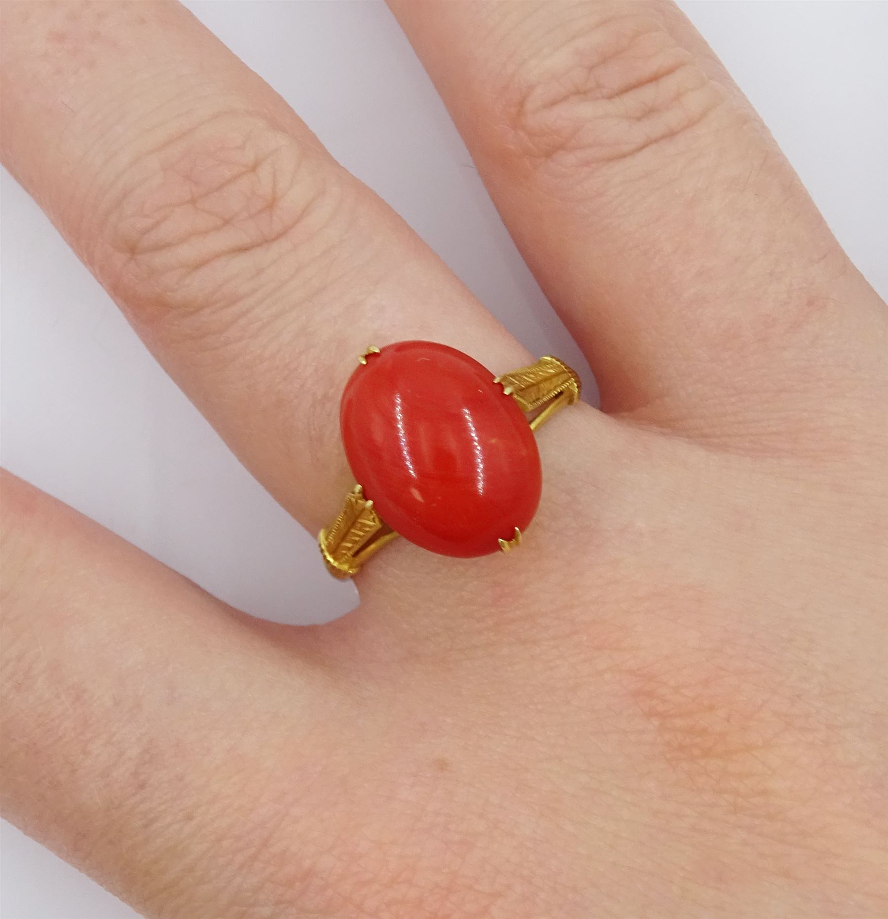 14ct gold single stone coral ring, stamped