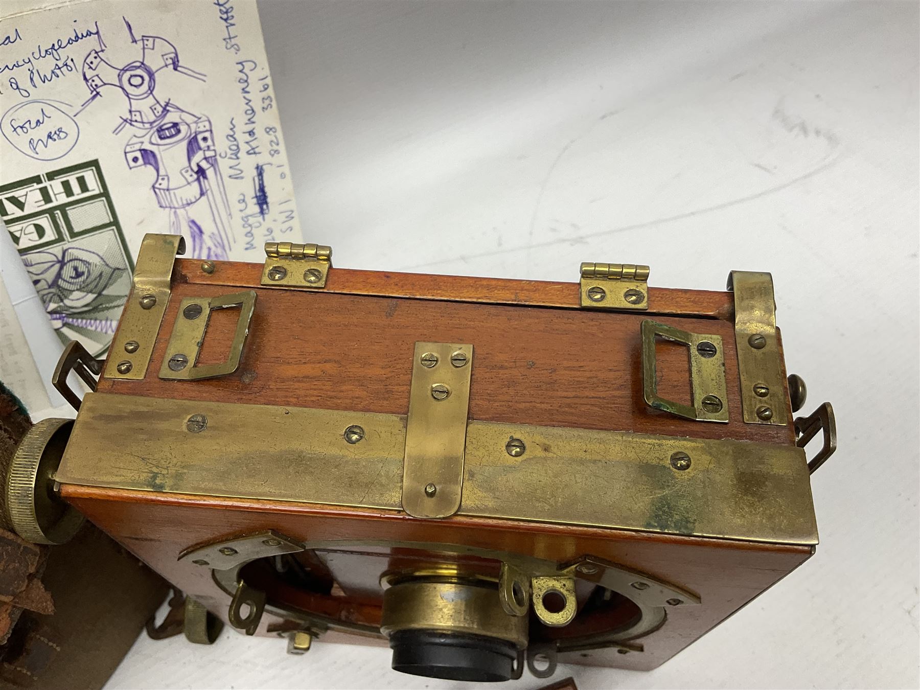 Sands Hunter & Co Ltd folding 1/4 plate camera in mahogany and lacquered brass, with two lenses and leather case