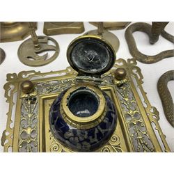 Brass inkstand, of square form, pierced, inset with blue and white ceramic inkwell to centre, together with a collation of brass candlesticks 