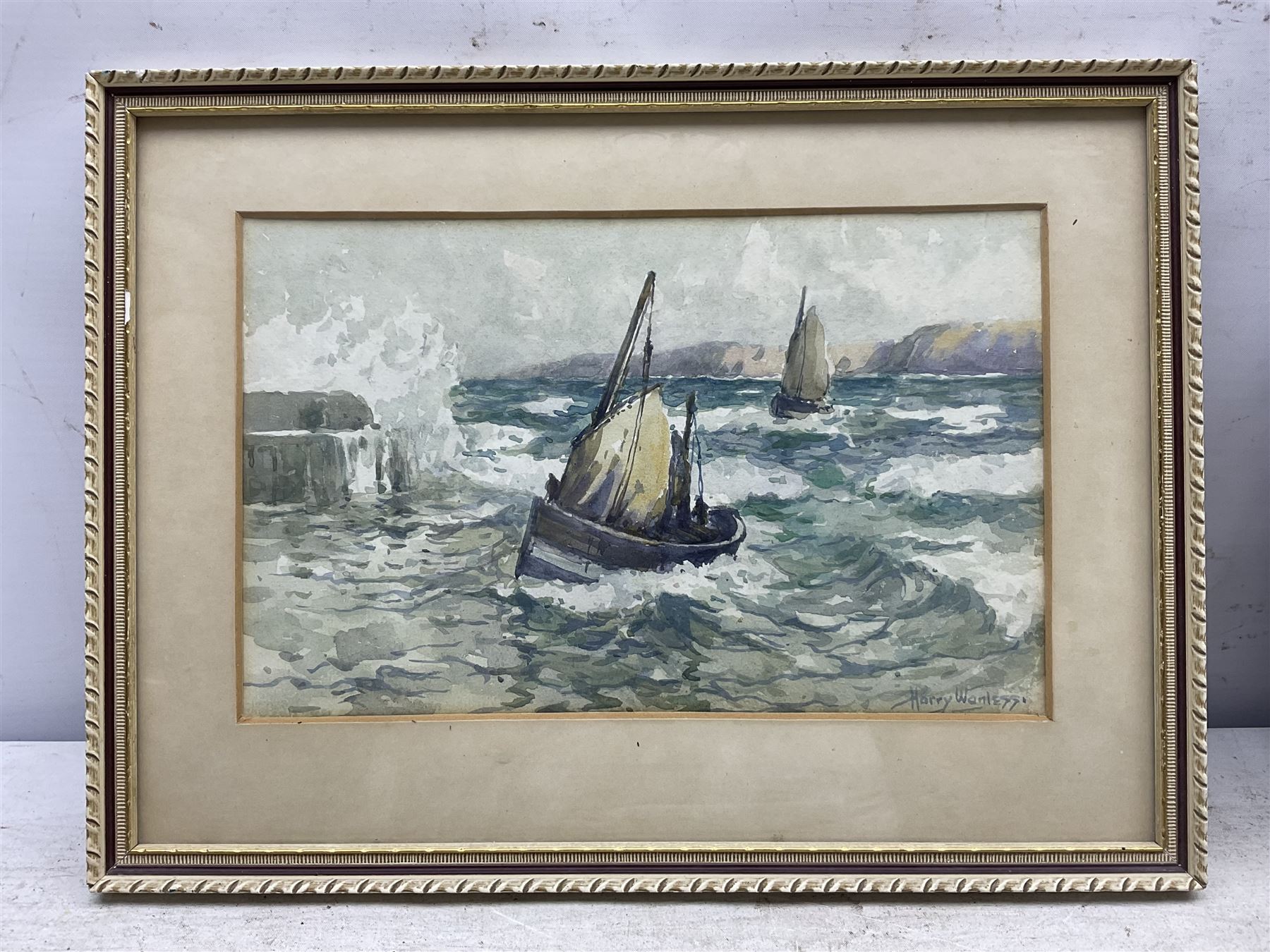 Harry Wanless (British c1872-1934): Fishing Boats returning to Scarborough Harbour in Rough Seas, watercolour signed 16cm x 25.5cm
Provenance: direct from the artist's family, part of a collection never previously seen on the market