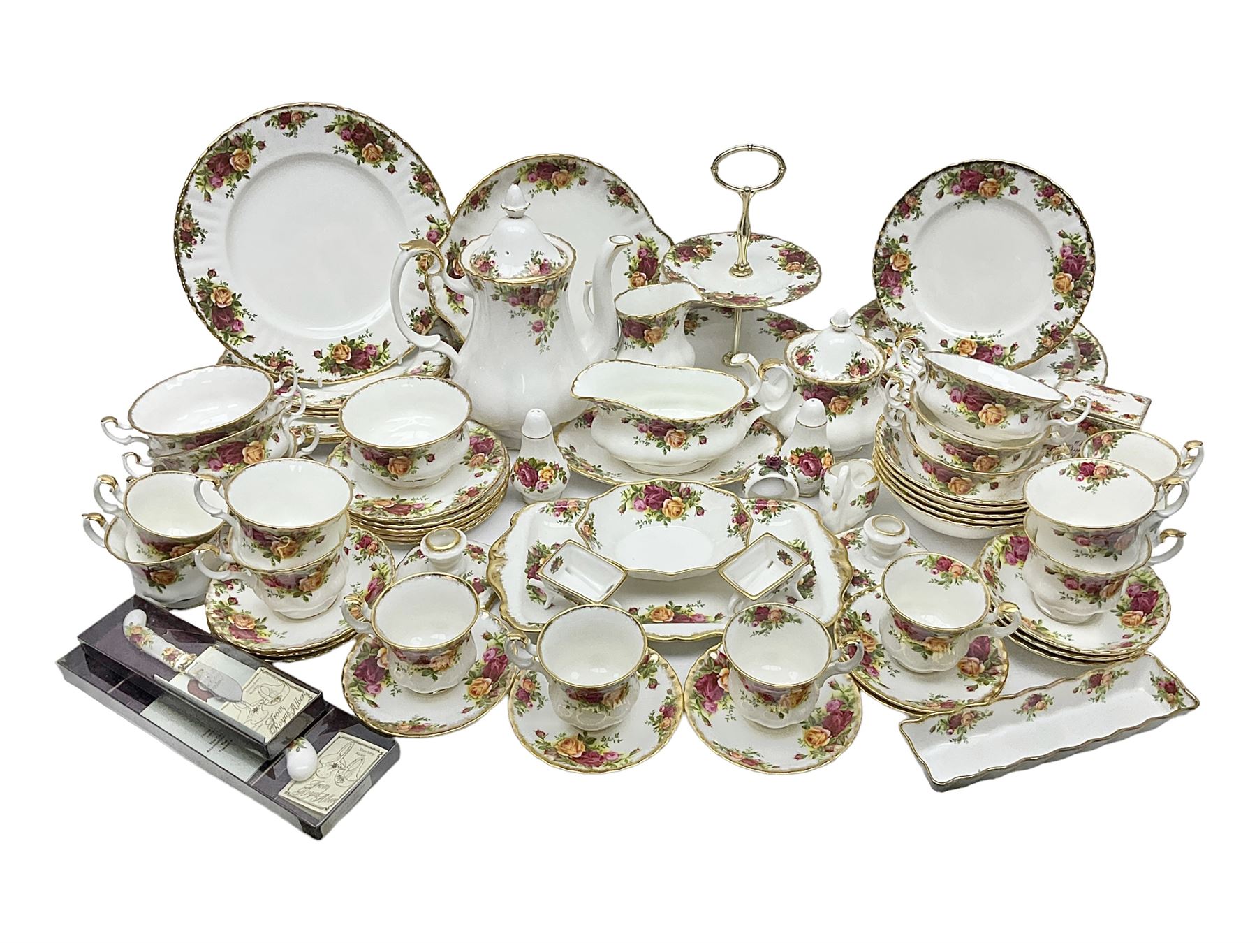 Royal Albert Old Country Roses pattern coffee service for six, comprising coffee pot, milk jug, cups and saucers, cake plate, together with miniature teapot, six teacups and saucers, six dinner plates, six side plates etc 