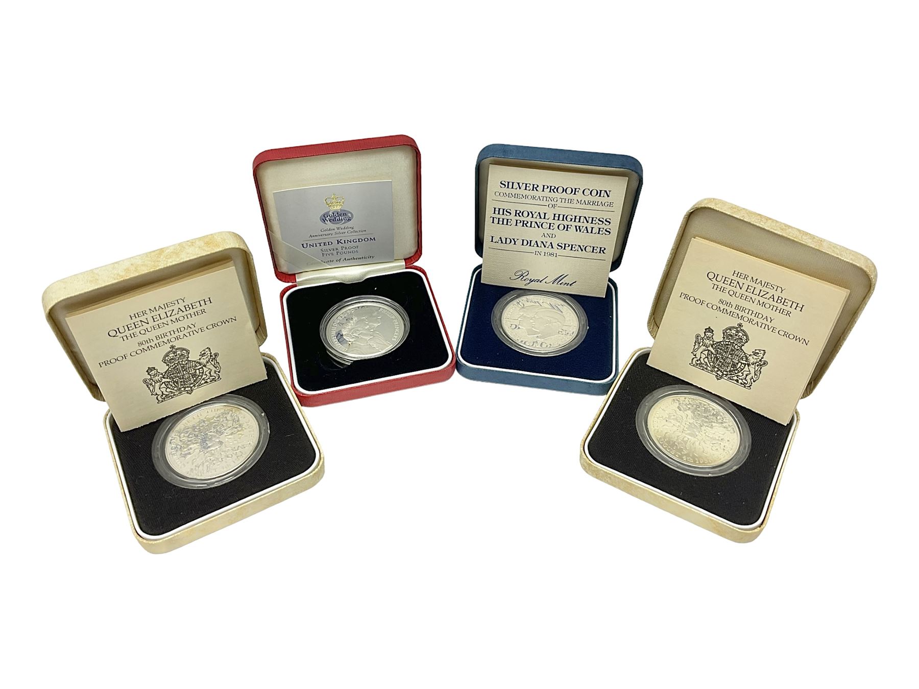 Four The Royal Mint United Kingdom silver proof coins, comprising two 1980 'Her Majesty Queen Elizabeth The Queen Mother' crowns, 1981 'Commemorating The Marriage Of His Royal Highness The Prince Of Wales And Lady Diana Spencer' crown and 1997'Golden Wedding Anniversary' five pounds, all cased with certificates 