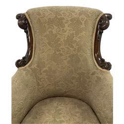 William IV mahogany framed armchair, rolled back with scroll carved uprights, acanthus carved arm terminals over serpentine fronted seat, raised on turned and lobe carved supports with castors