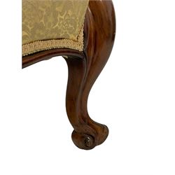 Victorian mahogany framed armchair, shaped and moulded frame carved with curled foliage, upholstered in pale gold floral pattern silk damask fabric, scrolled arm terminals on shaped moulded supports terminating to scroll carved feet