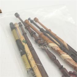 Collection of turned wooden lace maker's bobbins, including 19th century and later examples, two mother & babe carved bobbins etc, mostly with glass spangles (87 approx)