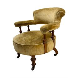 Victorian pair of mahogany armchairs, upholstered in gold velvet fabric, each with curved back, pierced splat and scroll arms, one with rounded seat and the other square, on turned front supports with castors