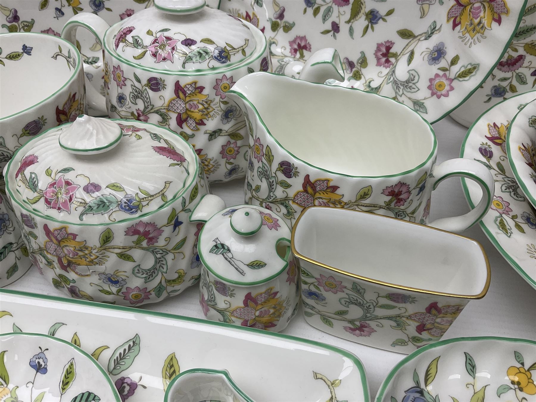 Minton Haddon Hall part tea service, including teapot, covered sucrier, milk jug, six teacups and saucers of various sizes, covered preserved jar, to vases etc (38)