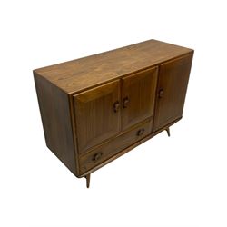 Lucian Ercolani for Ercol - 1960s elm sideboard, fitted with double cupboard, single cupboard and drawer, on tapering supports 