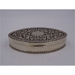 Edwardian silver trinket box, of navette form, the hinged cover with pierced floral and foliate decoration, and blank cartouche, hallmarked George Nathan & Ridley Hayes, Birmingham 1915 and stamped to base Pearce & Sons Silversmiths Leeds & York, W15.5cm, H3.5cm, 