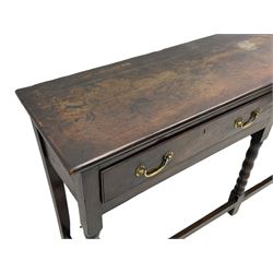 18th century oak dresser base, rectangular top, fitted with two drawers with moulded facia edges and brass swan neck handles, raised on turned front supports united by stretchers