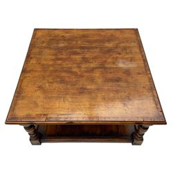 Square elm coffee table, square ovolo-moulded top with fruitwood band, turned supports united by undertier 