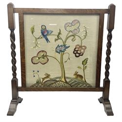 Tapestry fire screen depicting a landscape, with barley twist legs, H72cm