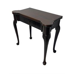 Late 18th century Irish mahogany tea table, rectangular form with projecting stepped rounded corners, fold-over action top over single frieze drawer within cock-beaded surround, on shell and bellflower carved cabriole supports, single gate-leg action base 