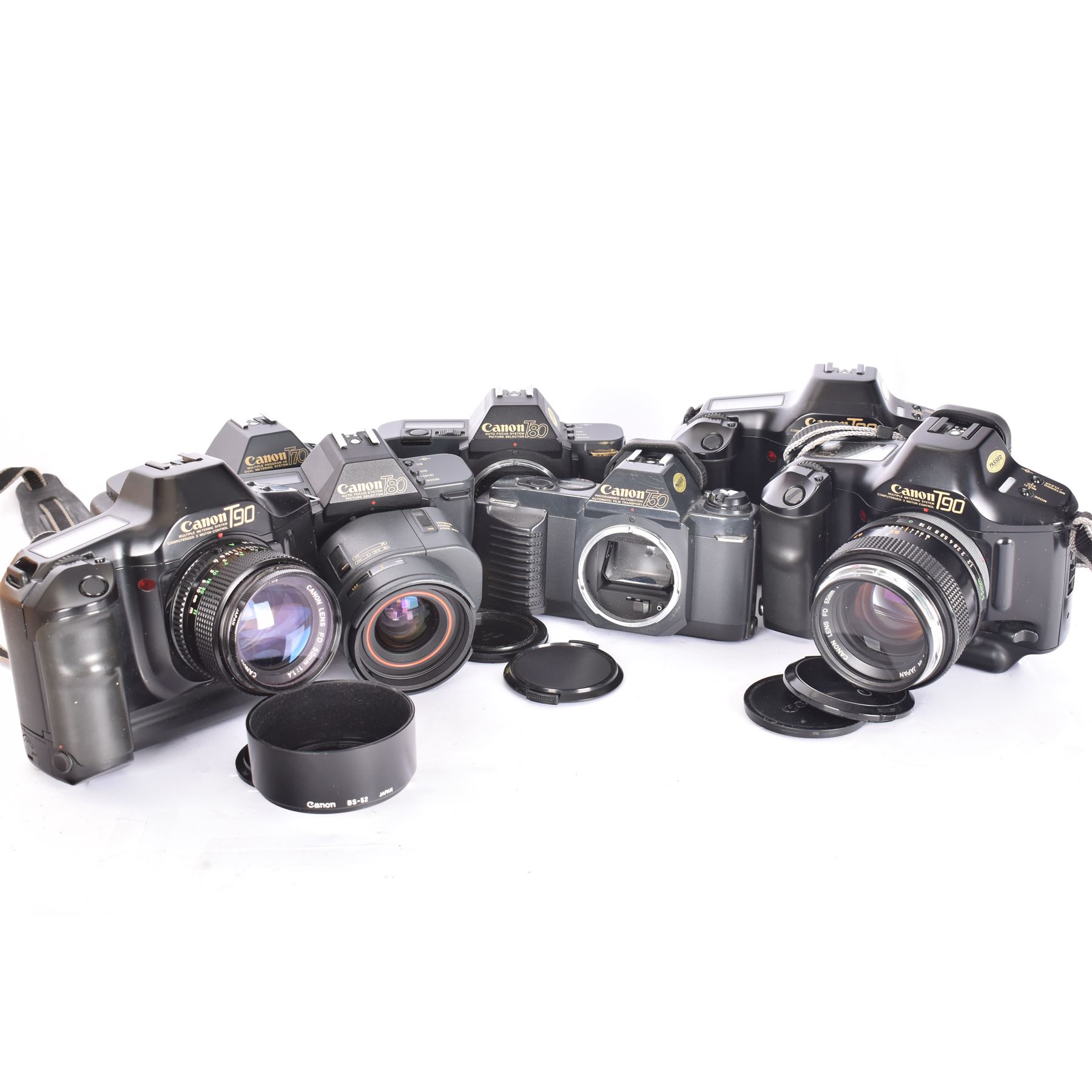 Seven Canon SLR camera bodies, comprising T50 serial no. 2011593, T70 serial no. 1319312, in carry case, two T80 examples, serial nos. 242362 & 256560, one with a Canon AC 35-70mm 1:3.5-4.5 zoom lens, and three T90 examples, serial nos. 1174363, 1005979 & 1019836, one example with a Canon FD 55mm 1:12 lens and one with a Canon FD 50mm 1:1.4 lens, one example with box