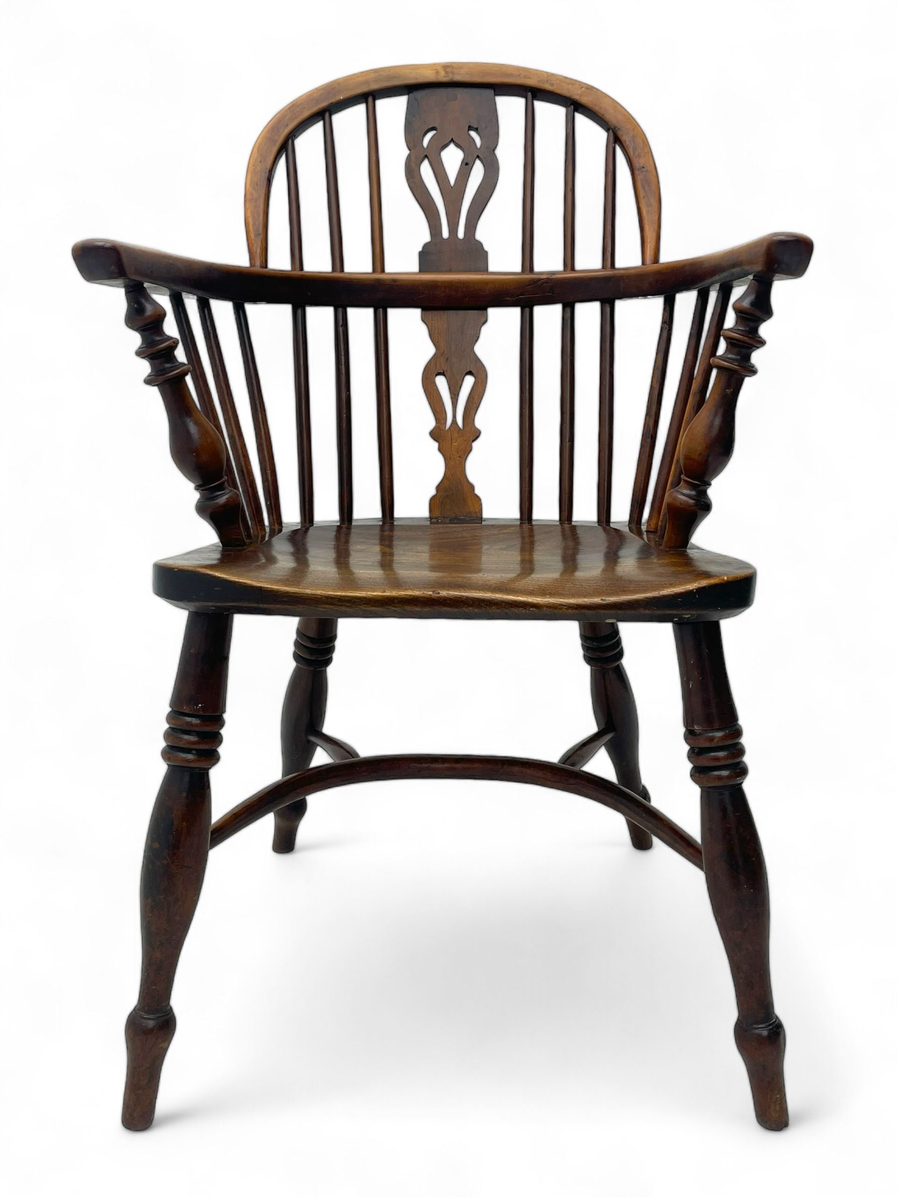 19th century yew wood and elm Windsor armchair, low double hoop stick and pierced splat back, dished seat on turned supports united by crinoline stretchers